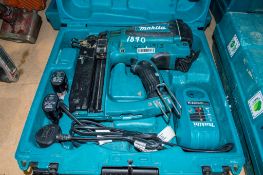 Makita GF600 cordless nailer c/w 2 batteries, charger and carry case ** Rear cover dismantled **