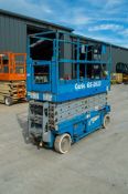 Genie GS2632 battery electric scissor lift Year: 2002 S/N: 46756 Recorded Hours: 552 9651