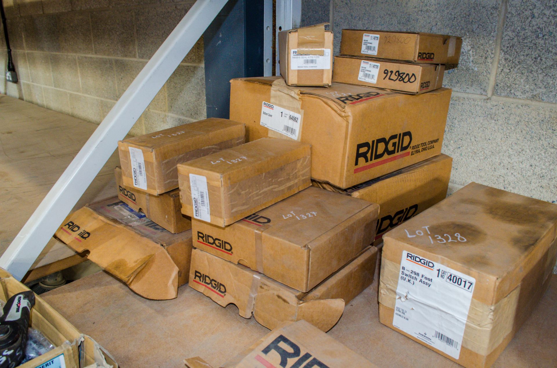 Quantity of various new and unused Ridgid spares comprising: 3 - back plates, 2 - bottom covers, 3 -