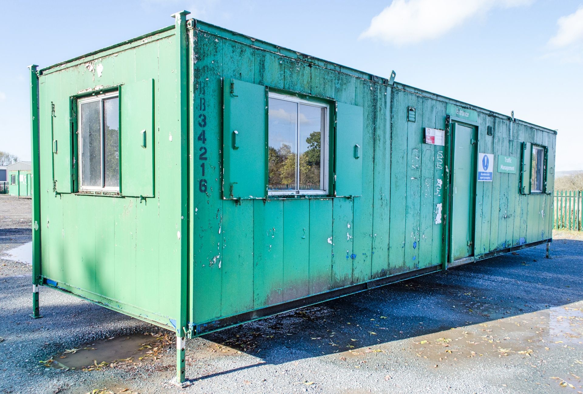32 ft x 10 ft steel anti vandal jack leg office site unit Comprising of: lobby & 2 - offices