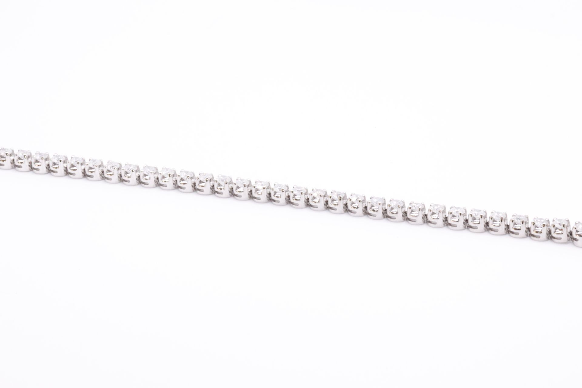 'Brand New' 7.0 Carat 18ct White Gold Tennis Bracelet set with Round Brilliant Cut Natural Diamonds