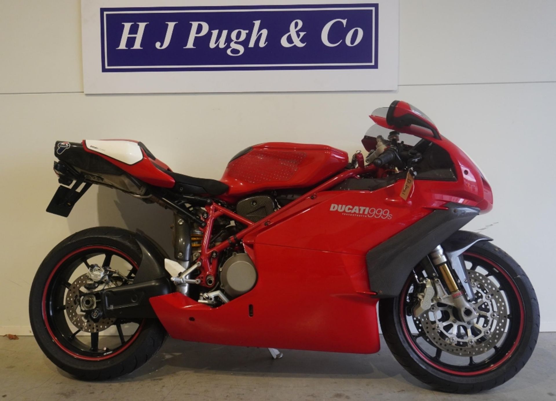 Ducati 999s motorcycle. 2005. 998cc. Runs but needs new battery. Comes with folder of history and