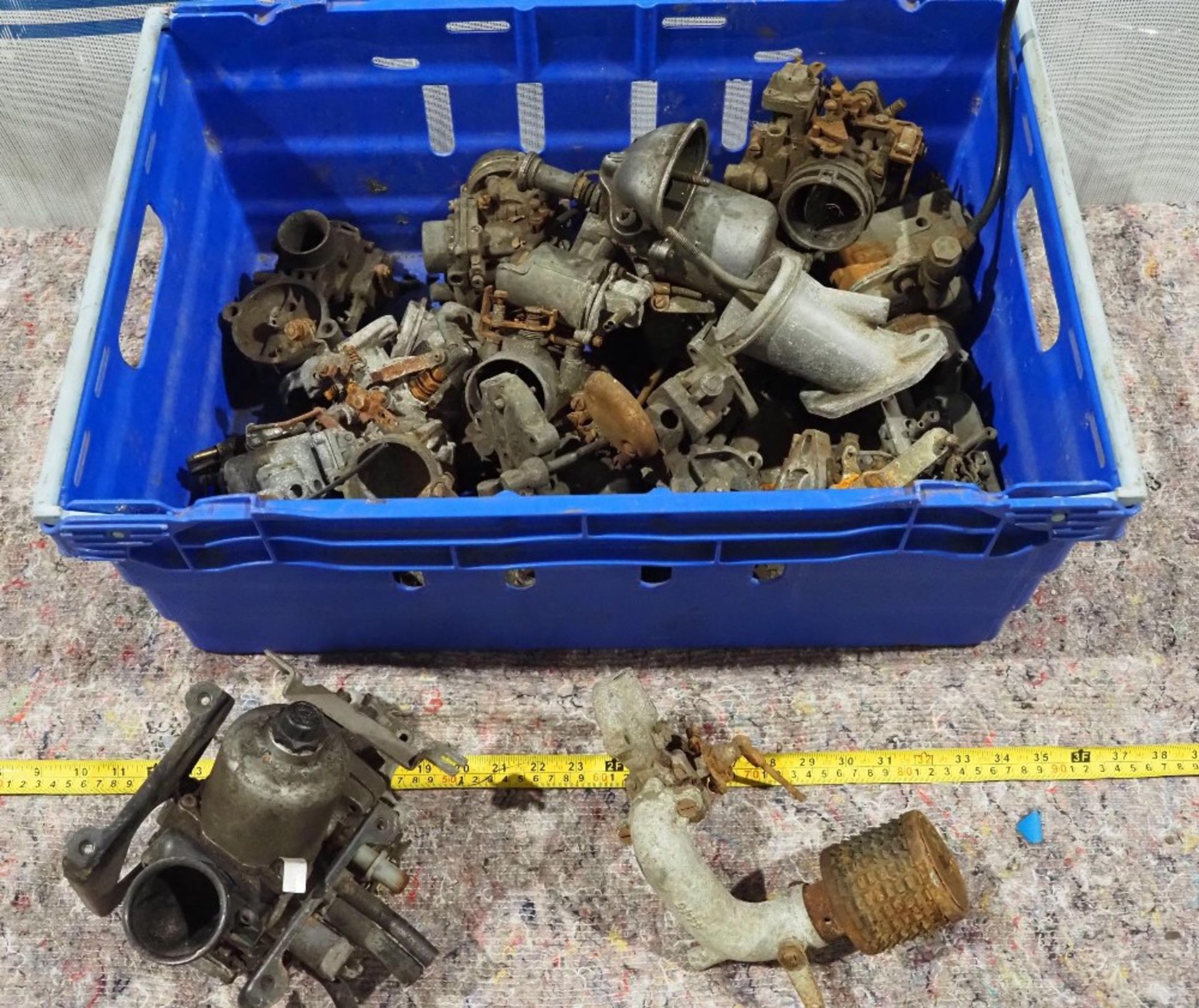 Box of assorted carburettors