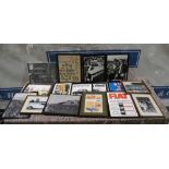 Quantity of framed photos and advertising material