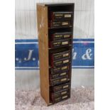 Wooden storage rack with quantity of Mintex fan belts NOS