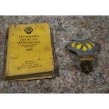 AA car mascot and AA members annual handbook 1955