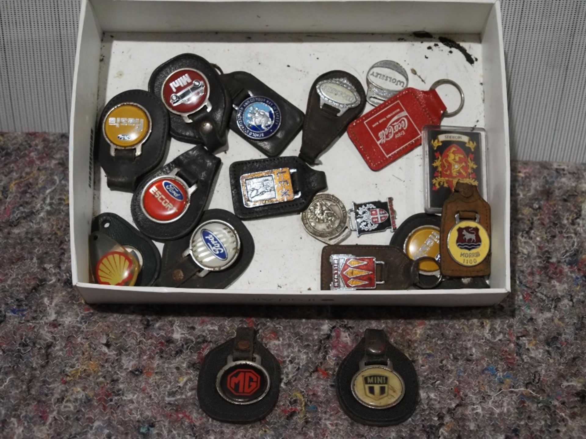 Box of assorted key fobs to include MG and Mini