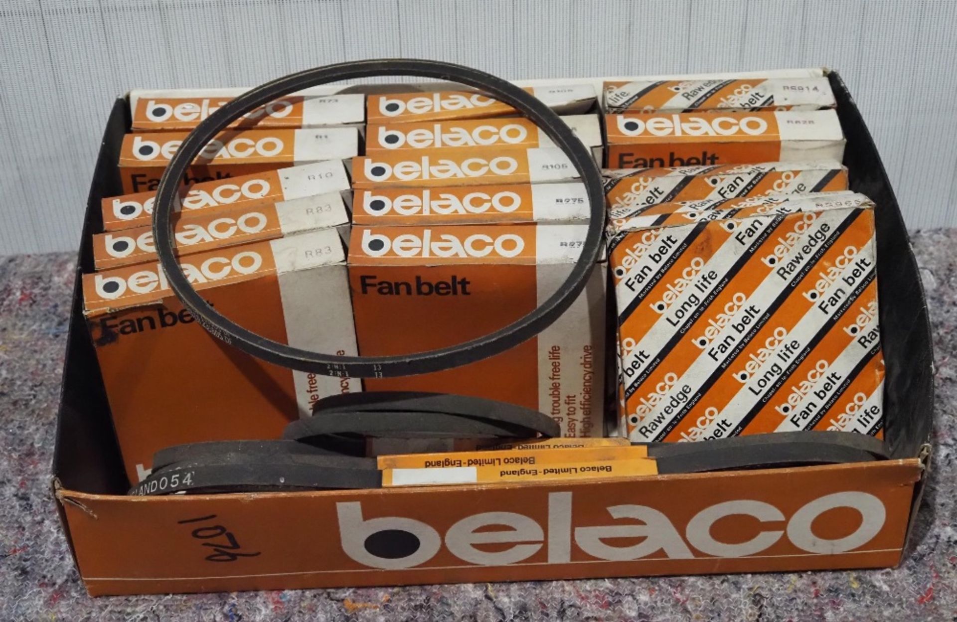 Box of assorted fan belts NOS