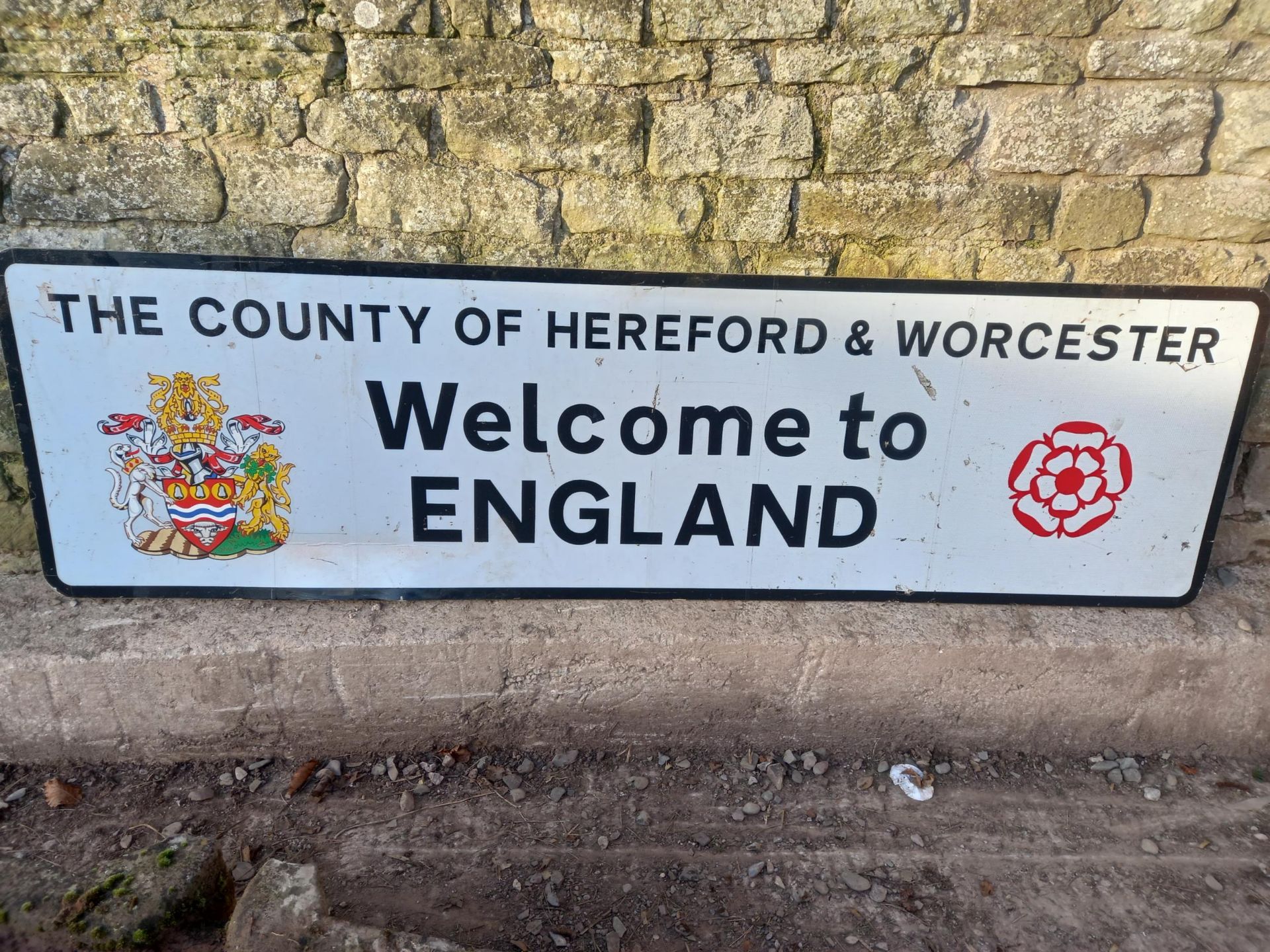 Road sign- Welcome to England 2400x600mm. Proceeds to British Red Cross Ukraine crisis appeal.