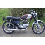 Triumph 600 motorcycle. 1961. Fitted with later rare side points T100SC engine. Disc front end,
