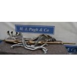 2- Triumph TR7/TR8 stainless steel exhaust manifolds, Austin Mini exhaust and 2 others