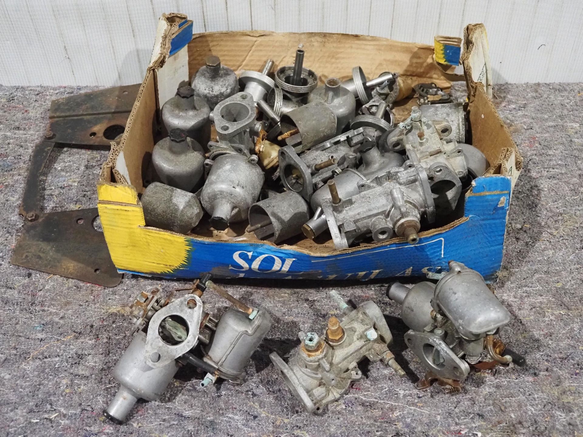 Box of assorted SU carburettor parts