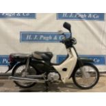 Honda Super Cub moped. 2012. Vin No- AA04-1003482. Runs but needs battery. No V5. NOVA Available.