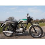 Triumph motorcycle. Believed to be a T100. Has other parts on it. Owned for many years by previous