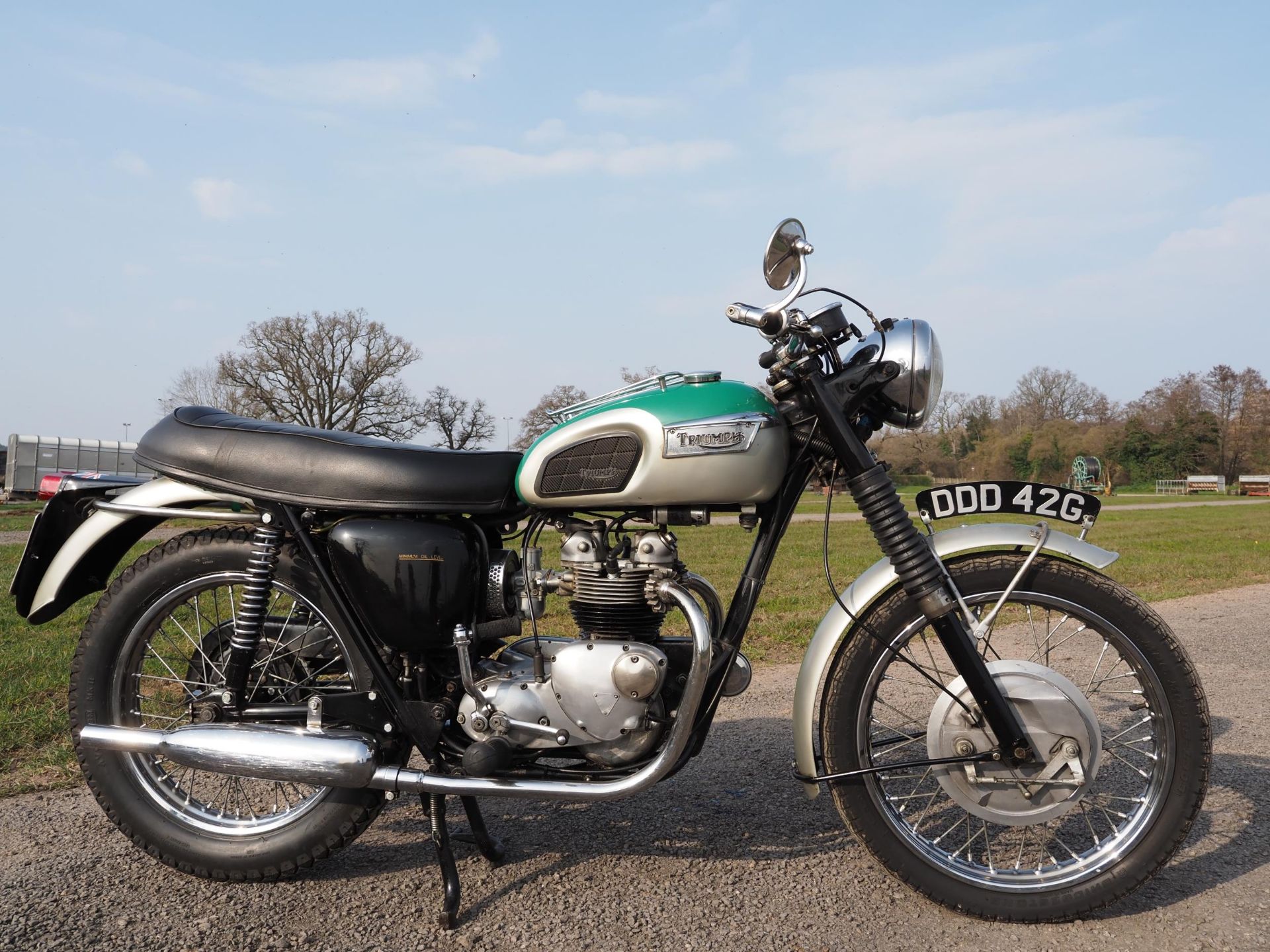 Triumph motorcycle. Believed to be a T100. Has other parts on it. Owned for many years by previous