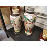 Pair of Early 20th Century Oriental Warrior/Dragon Vases - possibly Chinese