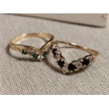 Pair of 9ct Gold Wishbone Dress Rings, one Diamond & Sapphire (size M) + Diamond & Emerald (size P+0