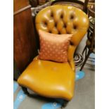 Brown Leather Nursing Chair w/brass seamwork - 85cm high by 57w by 80d