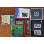 A collection of 7 UK stamp presentation packs, including 1980 Royal Mail