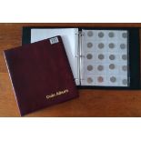 Two coin folders, containing 48 50-pence pieces of various designs, plus a 4-coin case containing