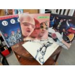 Quartet of First Pressing Devo LP Vinyl Records