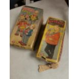 Pair of Early Rosko Tin Wind-Up Bartender and Musical Clown Toys