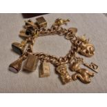 9ct Gold Charm Bracelet - 44.8g