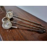 Quartet of Wooden Handled Antique Silver Serving Ladels