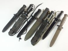 A collection of survival knives and bayonets including L1A3 SLR