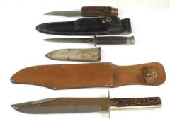 A group of knives comprising Bowie knives, scout knife, Leopard knife