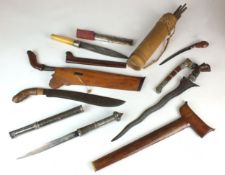 A collection of South East Asian daggers and weapons