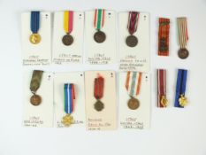 Twelve Italian and Belgian miniature medals