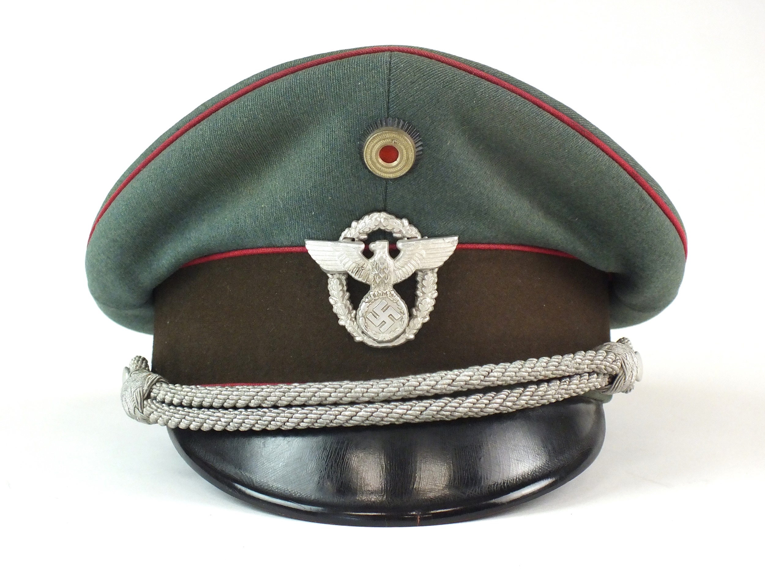 A scarce German Third Reich Municipal Protection Police visor cap