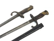 Two French 1874 Model Epee/Gras bayonets, with one scabbard