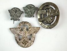 Four German police badges