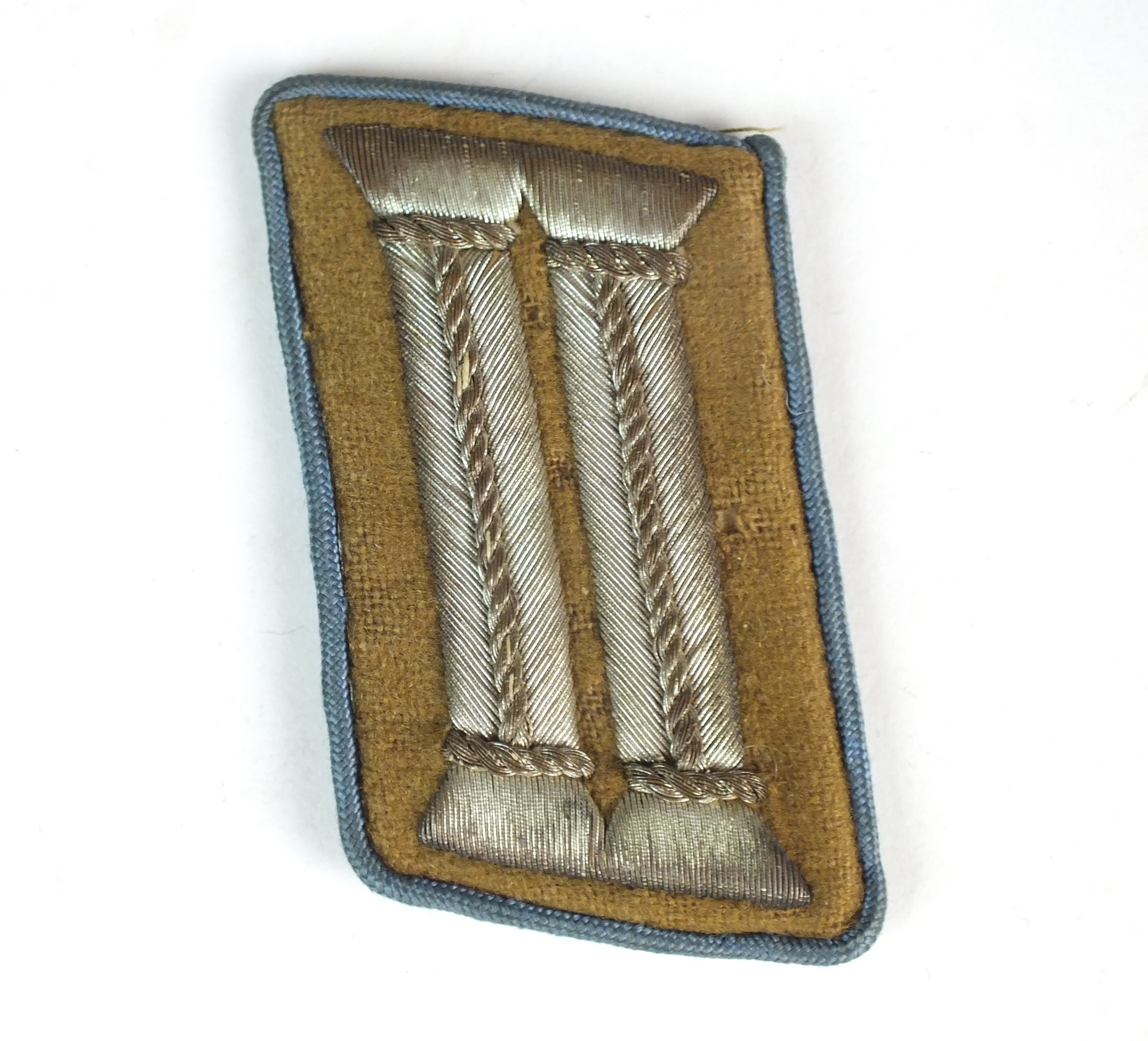 A single German NSDAP Political Leader collar tab, pre-war 1934-36 pattern, hand-embroidered in flat