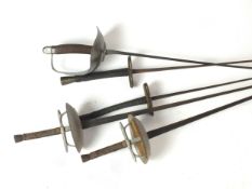 A group of five fencing foils, 19th century and 20th century