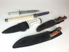 A group of daggers and knives