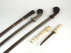 Two Malayan Parang Short Swords and a Japanese bone tanto