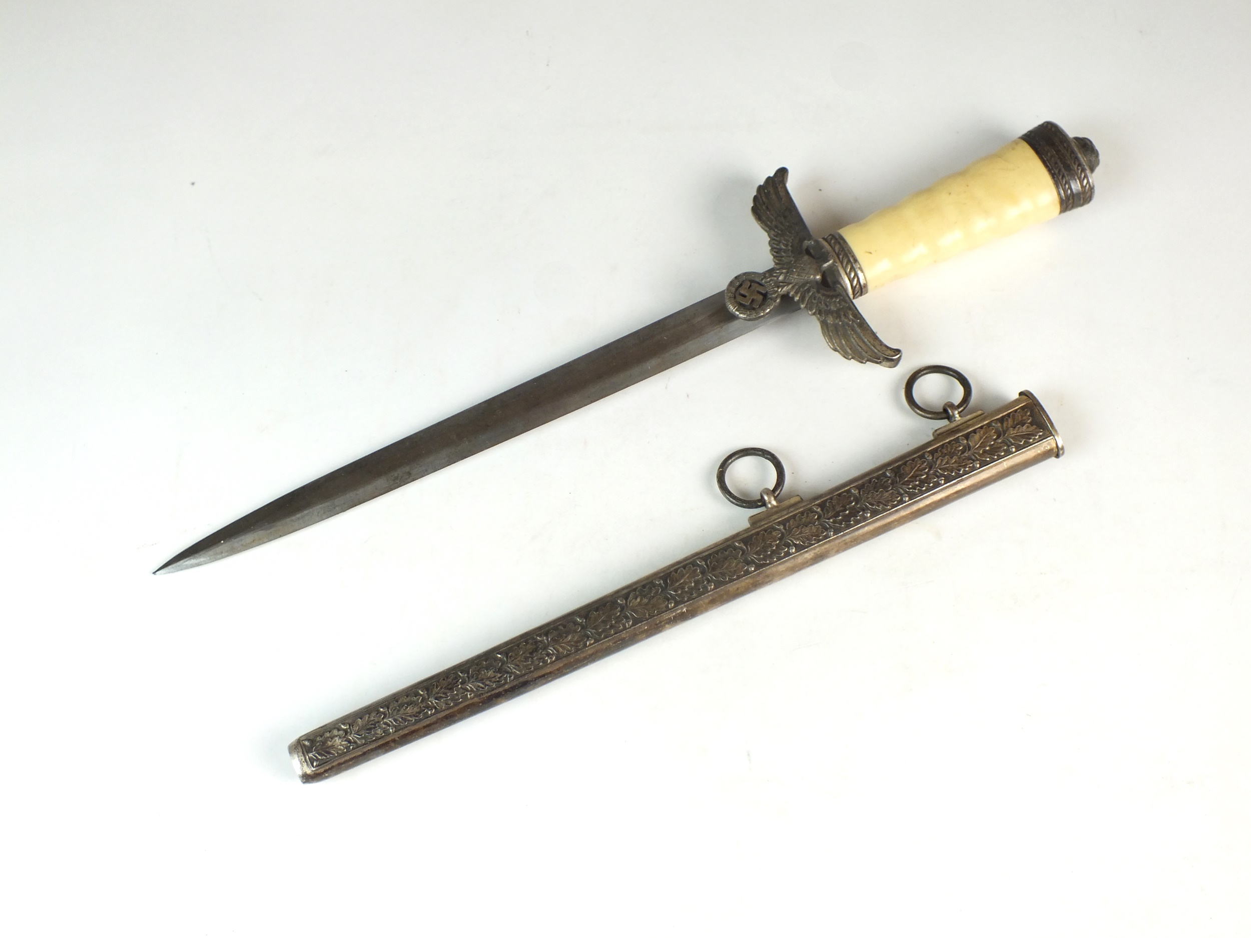 Post-war copy of a German Hermann Goring Industrial dagger in scabbard.