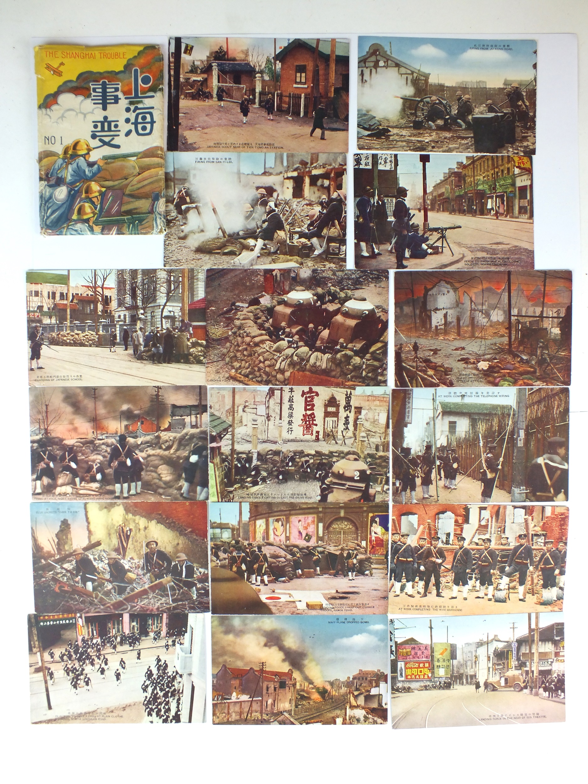 Scarce set of 'Shanghai Trouble' postcards with other military-related postcards and photographs.