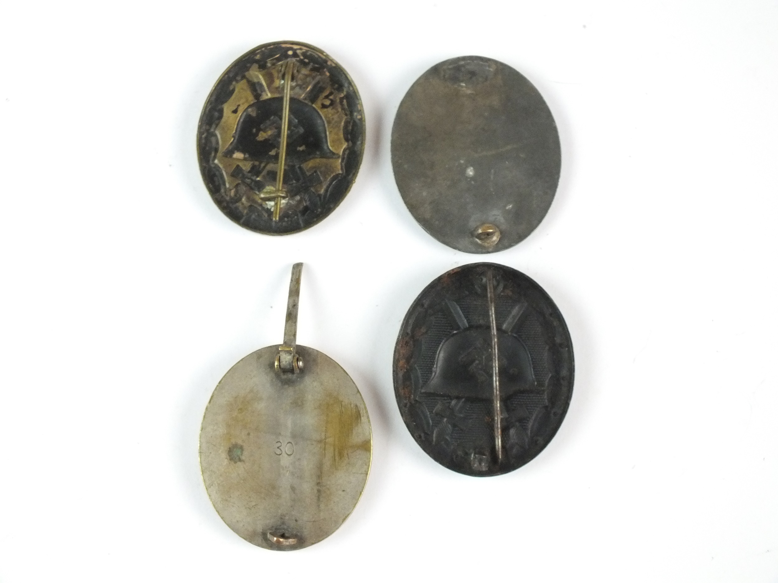 Four German Second World War wound badges - Image 2 of 2