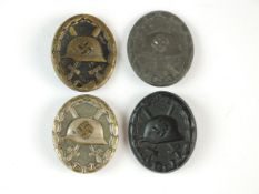 Four German Second World War wound badges