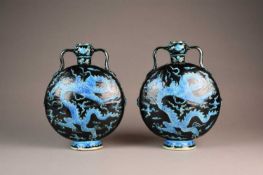 A pair of Chinese Fahua moon vases