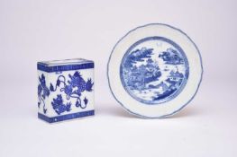 A Chinese blue and white pillow and a blue and white dish