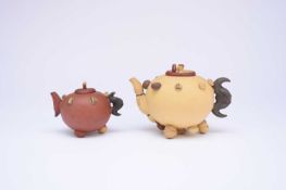 Two Chinese Yixing 'Hundred Fruit' teapots and covers