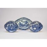 A pair of Chinese blue and white oval dishes and another, 18th century