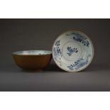 A pair of Chinese cafe-au-lait blue and white bowls from the Nanking Cargo