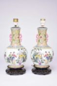 A pair of Chinese famille rose vases, Republic period
