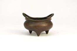 A small Chinese bronze censer